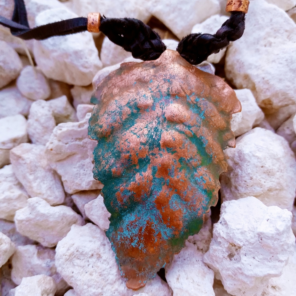 Handmade copper leaf necklace on leather cord
